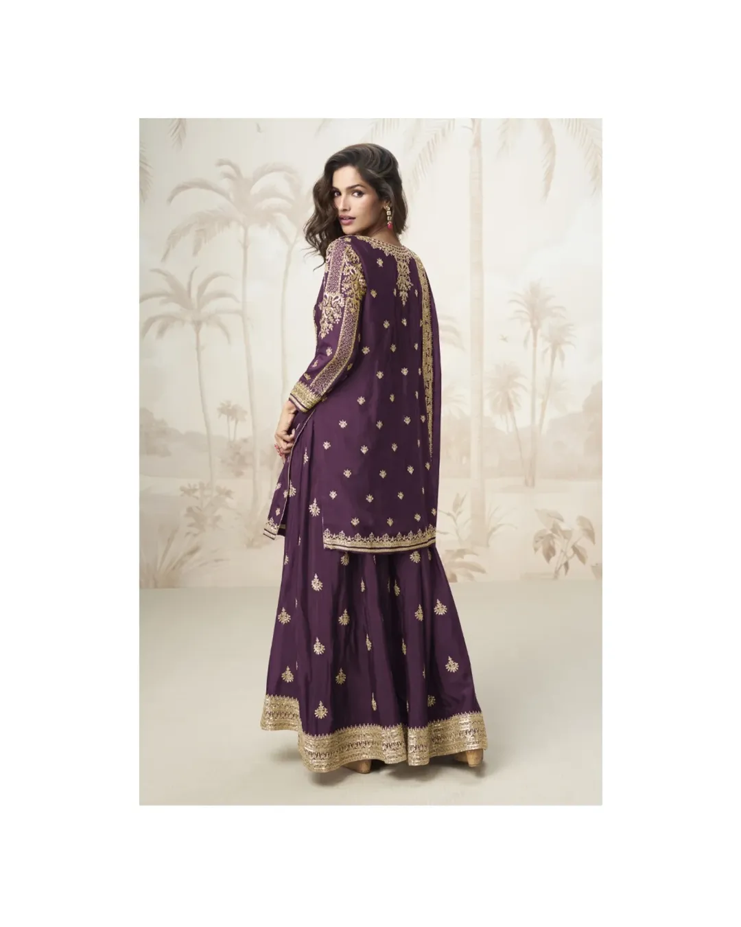 MUMTAZ X LABEL AASHIRWADDeep plum ethnic suit with intricate gold embroidery, featuring a long (1)