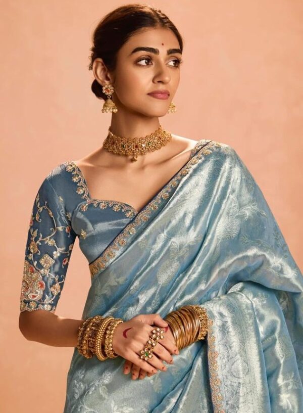 Pastel blue Tissue Silk saree with heavy embroidery border