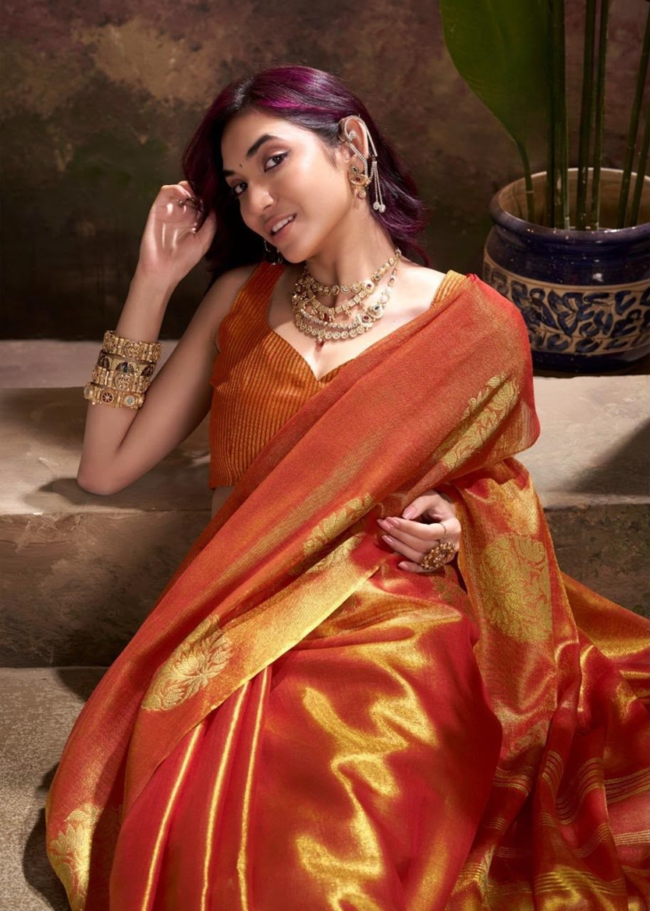 Rust Orange Tissue Silk Saree with Golden Floral Patterns