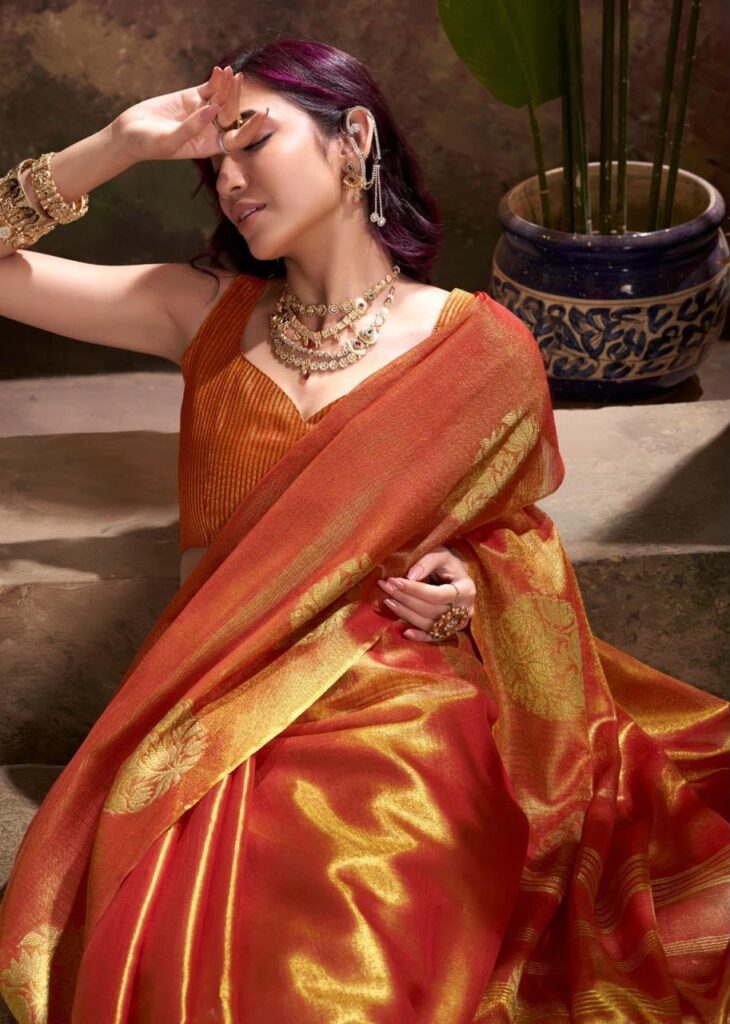 Rust Orange Tissue Silk Saree with Golden Floral Patterns